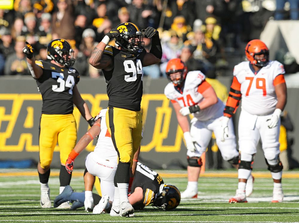 Iowa Hawkeyes defensive end A.J. Epenesa (94) celebrates a tackle during the third quarter of their game at Kinnick Stadium in Iowa City on Saturday, Nov 23, 2019. (Stephen Mally/hawkeyesports.com)