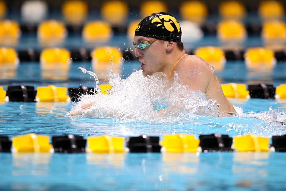Iowa’s Ryan Purdy swims the men’s 100 yard breaststroke event during their meet at the Campus Recreation and Wellness Center in Iowa City on Friday, February 7, 2020. (Stephen Mally/hawkeyesports.com)