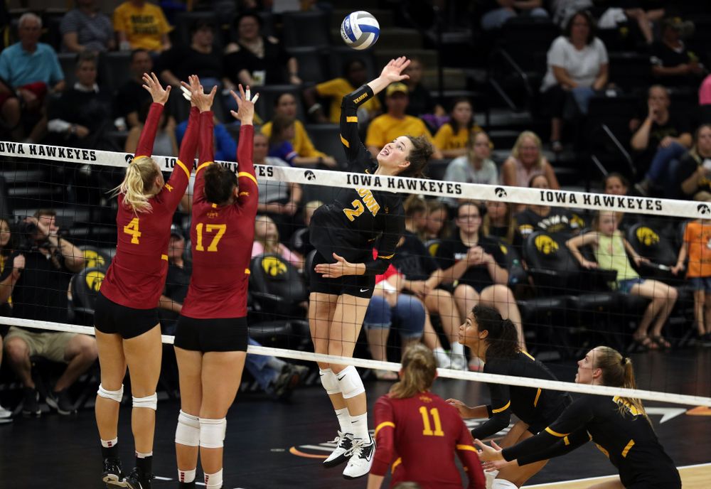 Iowa Hawkeyes setter Courtney Buzzerio (2) goes up to hit the ball against the Iowa State Cyclones Saturday, September 21, 2019 during the Iowa Corn Cy-Hawk Series Tournament at Carver-Hawkeye Arena. (Brian Ray/hawkeyesports.com)