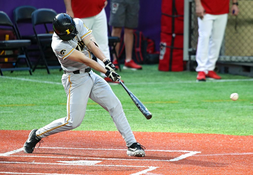 Iowa Hawkeyes infielder Dylan Nedved (17) gets a hit during the seventh inning of their CambriaCollegeClassic game at U.S. Bank Stadium in Minneapolis, Minn. on Friday, February 28, 2020. (Stephen Mally/hawkeyesports.com)