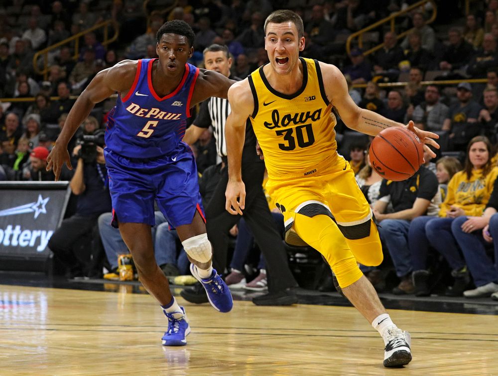 Iowa Hawkeyes guard Connor McCaffery (30) drives to the basket during the first half of their game at Carver-Hawkeye Arena in Iowa City on Monday, Nov 11, 2019. (Stephen Mally/hawkeyesports.com)