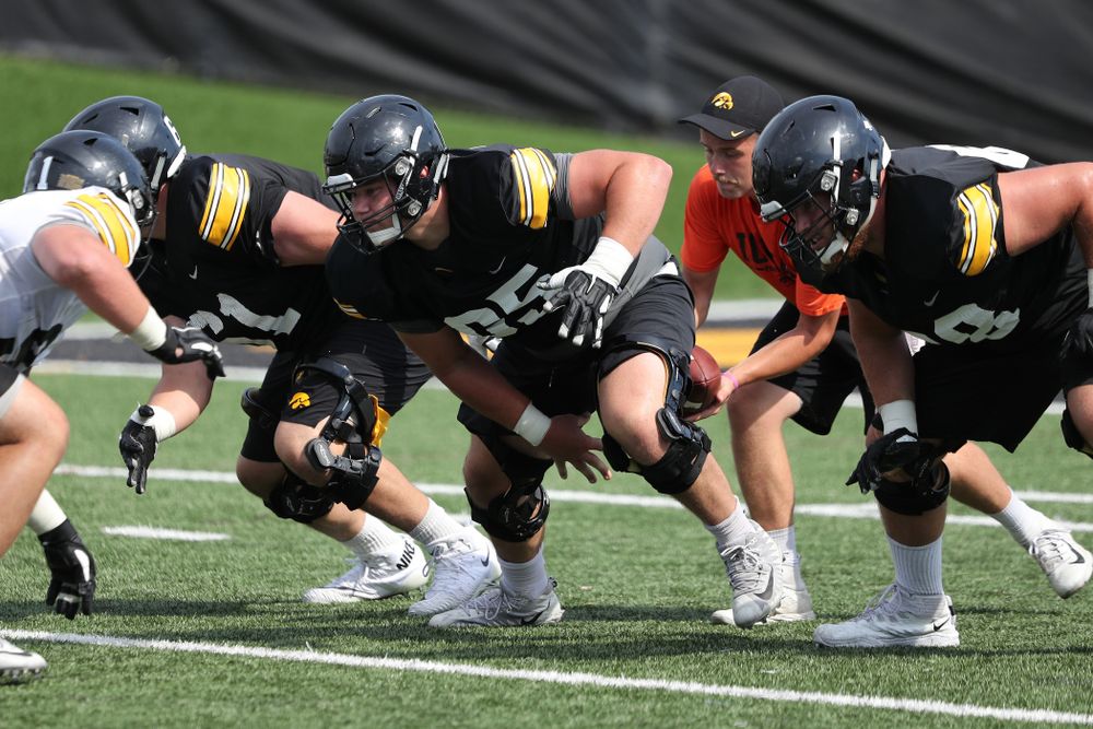 Iowa Hawkeyes offensive lineman Tyler Linderbaum (65) during Fall Camp Practice No. 4 Monday, August 5, 2019 at the Ronald D. and Margaret L. Kenyon Football Practice Facility. (Brian Ray/hawkeyesports.com)