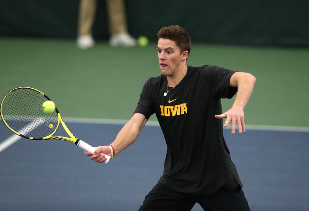 Joe Tyler against the Miami Hurricanes Friday, February 8, 2019 at the Hawkeye Tennis and Recreation Complex. (Brian Ray/hawkeyesports.com)