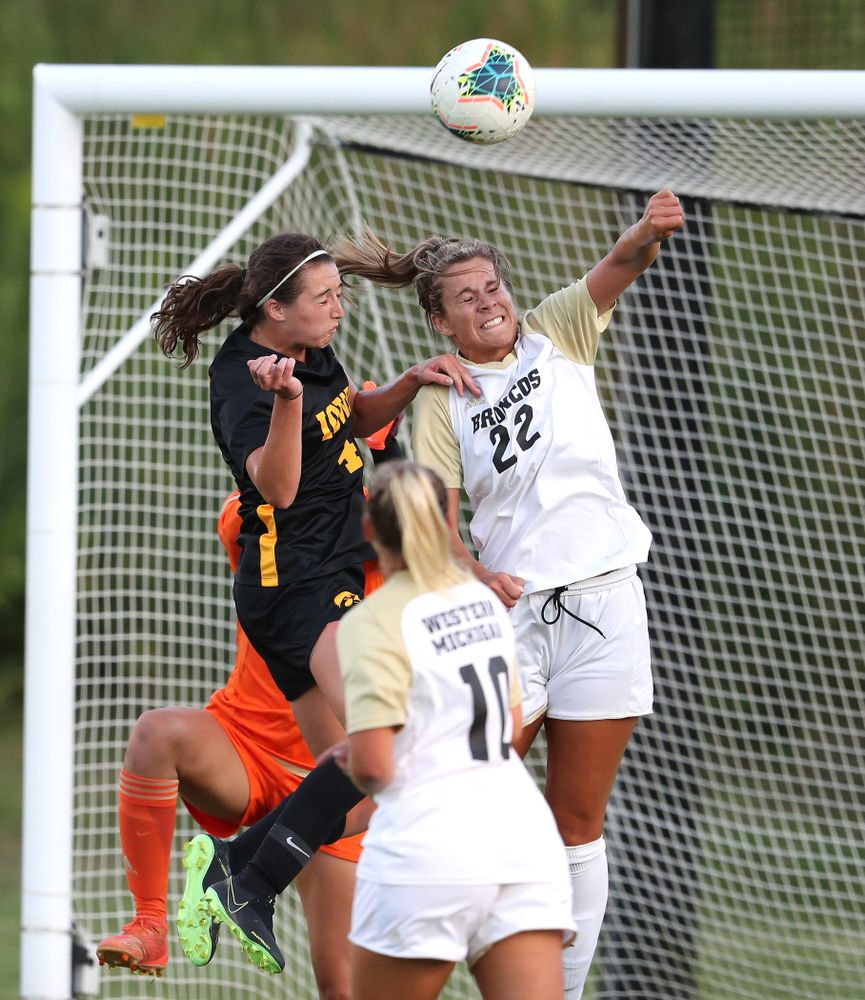 Iowa Hawkeyes forward Kaleigh Haus (4) heads the ball into the goal against Western Michigan Thursday, August 22, 2019 at the Iowa Soccer Complex. (Brian Ray/hawkeyesports.com)