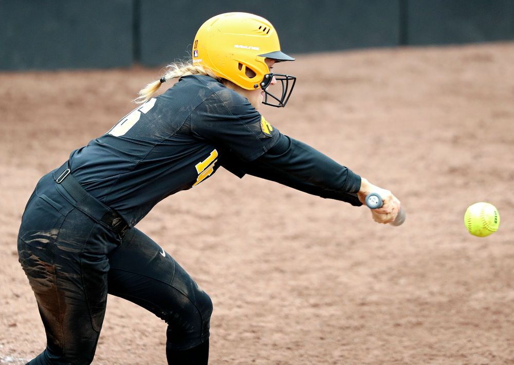 Iowa infielder Mia Ruther (26) lays down a bunt during the fifth inning of their game against Iowa Softball vs Indian Hills Community College at Pearl Field in Iowa City on Sunday, Oct 6, 2019. (Stephen Mally/hawkeyesports.com)