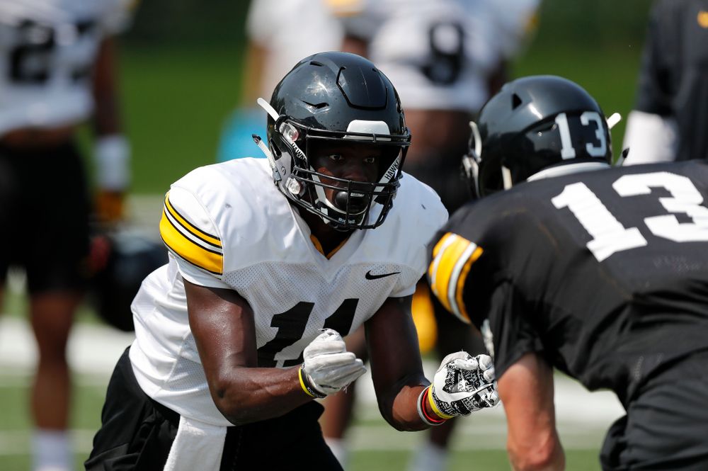 Iowa Hawkeyes defensive back Michael Ojemudia (11) during fall camp practice No. 9 Friday, August 10, 2018 at the Kenyon Practice Facility. (Brian Ray/hawkeyesports.com)