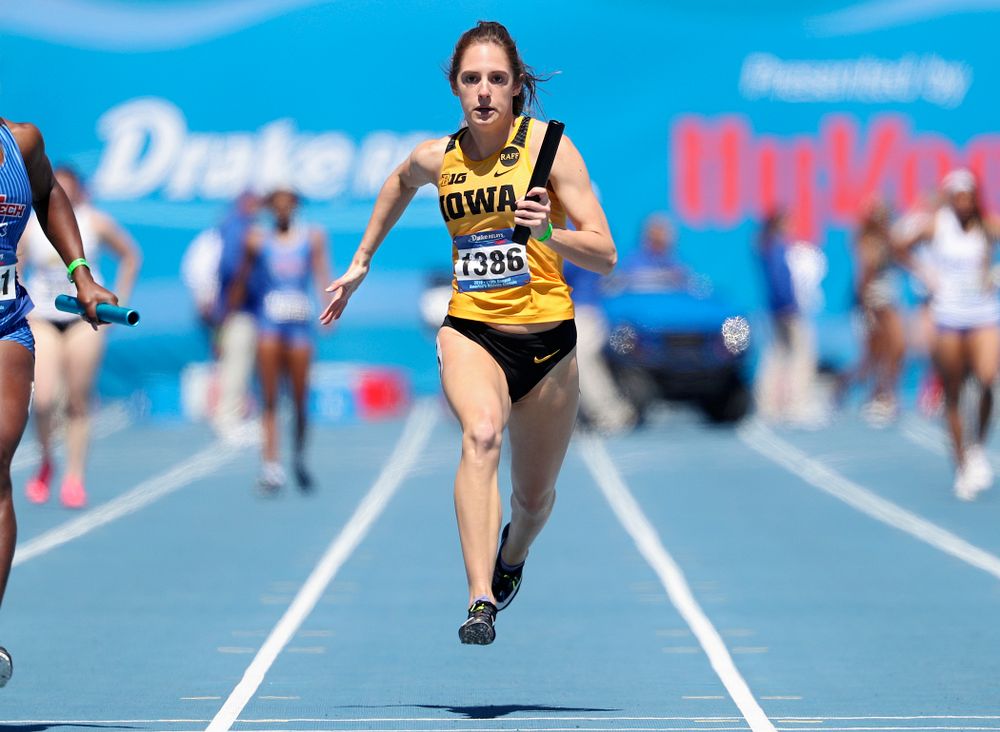 Iowa's Talia Buss runs in the women's 400 meter relay event during the second day of the Drake Relays at Drake Stadium in Des Moines on Friday, Apr. 26, 2019. (Stephen Mally/hawkeyesports.com)