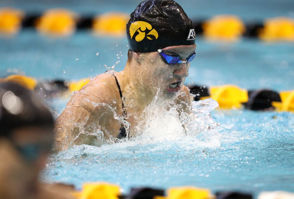Iowa's Sage Ohlensehlen swims the breaststroke leg of the 200 yard medley relay during a double dual against Wisconsin and Northwestern Saturday, January 19, 2019 at the Campus Recreation and Wellness Center. (Brian Ray/hawkeyesports.com)