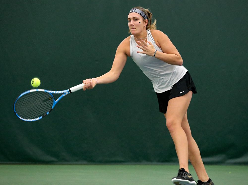 Iowa’s Ashleigh Jacobs returns a shot during her doubles match at the Hawkeye Tennis and Recreation Complex in Iowa City on Sunday, February 16, 2020. (Stephen Mally/hawkeyesports.com)