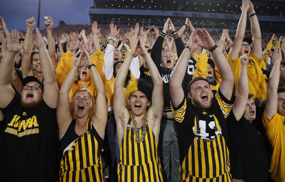 The student second cheers for the Iowa Hawkeyes against the Miami RedHawks Saturday, August 31, 2019 at Kinnick Stadium in Iowa City. (Brian Ray/hawkeyesports.com)