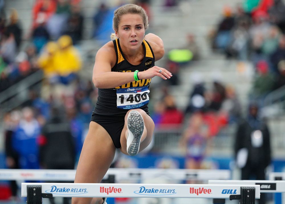 Iowa's Addie Swanson runs the women's shuttle hurdles event during the third day of the Drake Relays at Drake Stadium in Des Moines on Saturday, Apr. 27, 2019. (Stephen Mally/hawkeyesports.com)