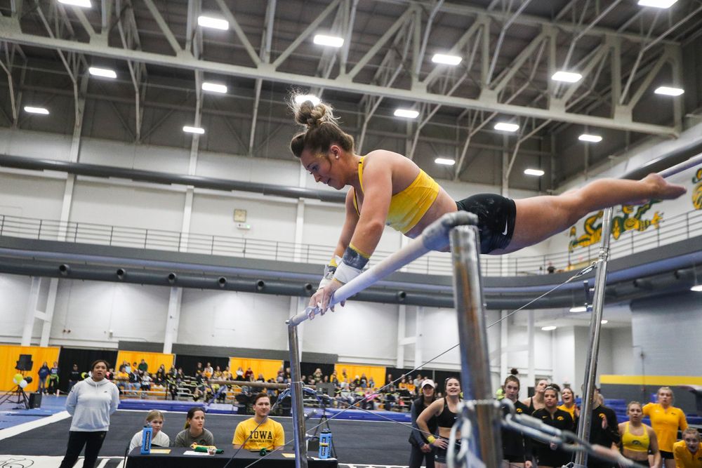 Maddie Kampschroeder performs on the uneven bars during the Iowa women’s gymnastics Black and Gold Intraquad Meet on Saturday, December 7, 2019 at the UI Field House. (Lily Smith/hawkeyesports.com)