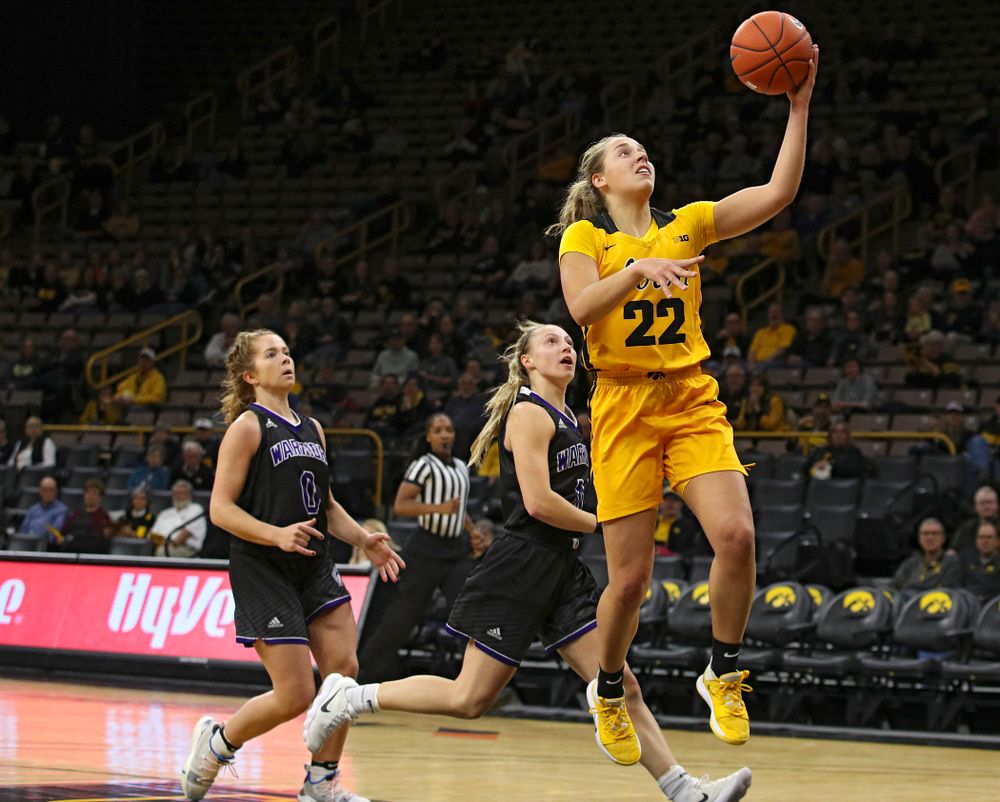 Iowa guard Kathleen Doyle (22) makes a basket during the first quarter of their game against Winona State at Carver-Hawkeye Arena in Iowa City on Sunday, Nov 3, 2019. (Stephen Mally/hawkeyesports.com)