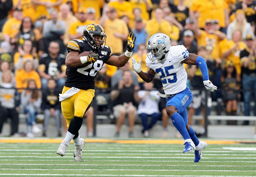 Iowa Hawkeyes running back Toren Young (28) on a run during the second quarter of their game at Kinnick Stadium in Iowa City on Saturday, Sep 28, 2019. (Stephen Mally/hawkeyesports.com)
