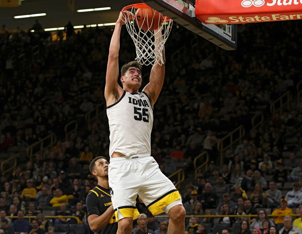 Iowa Hawkeyes center Luka Garza (55) dunks the ball during the second half of their their game at Carver-Hawkeye Arena in Iowa City on Sunday, December 29, 2019. (Stephen Mally/hawkeyesports.com)