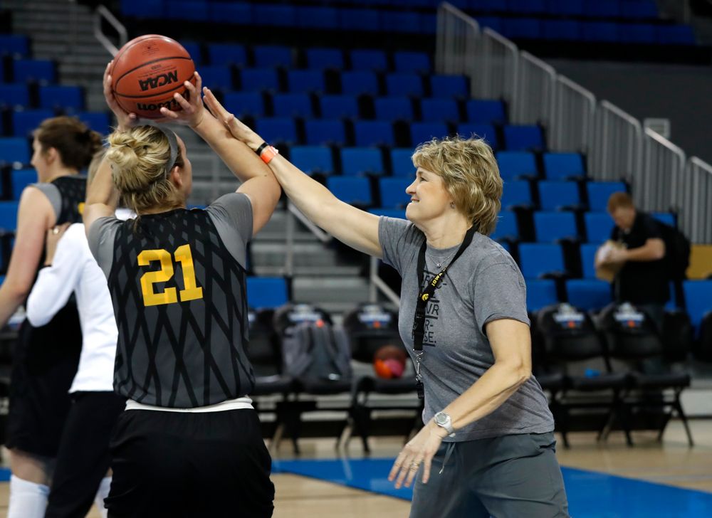 Iowa Hawkeyes head coach Lisa Bluder defends a shot by forward Hannah Stewart (21) during practice Friday, March 16, 2018 at Pauley Pavilion on the campus of UCLA. (Brian Ray/hawkeyesports.com)