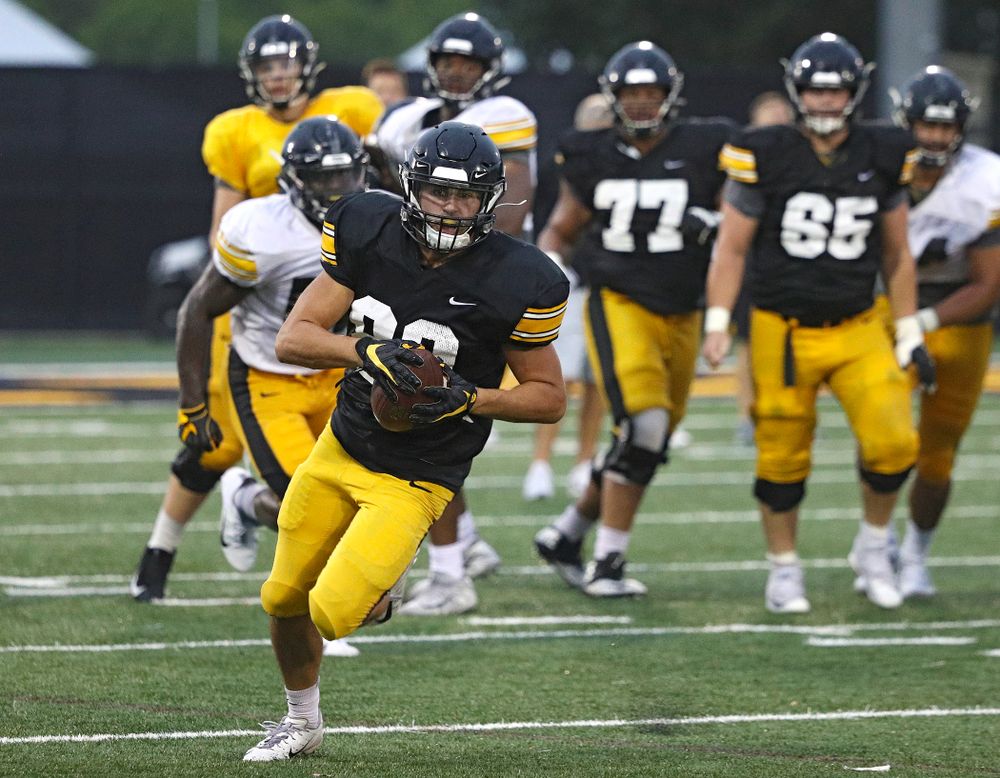 Iowa Hawkeyes wide receiver Nico Ragaini (89) runs after catching a pass durning Fall Camp Practice No. 17 at the Hansen Football Performance Center in Iowa City on Wednesday, Aug 21, 2019. (Stephen Mally/hawkeyesports.com)