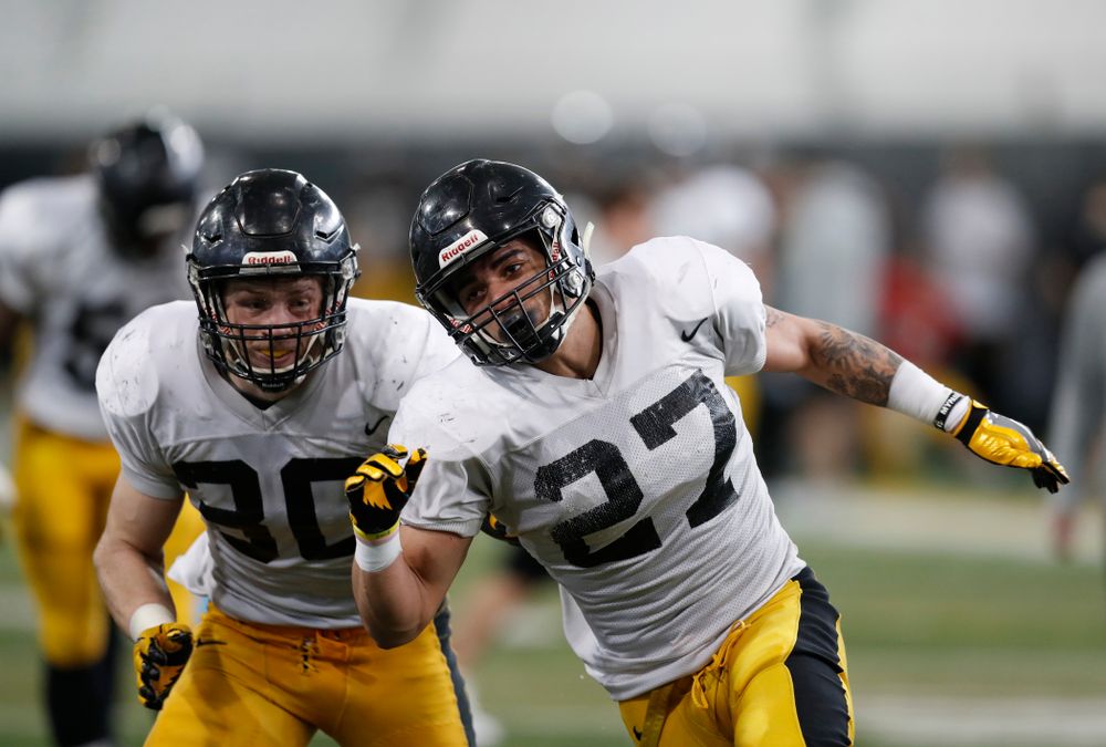 Iowa Hawkeyes defensive back Amani Hooker (27) and defensive back Jake Gervase (30) during spring practice  Thursday, March 29, 2018 at the Hansen Football Performance Center. (Brian Ray/hawkeyesports.com)