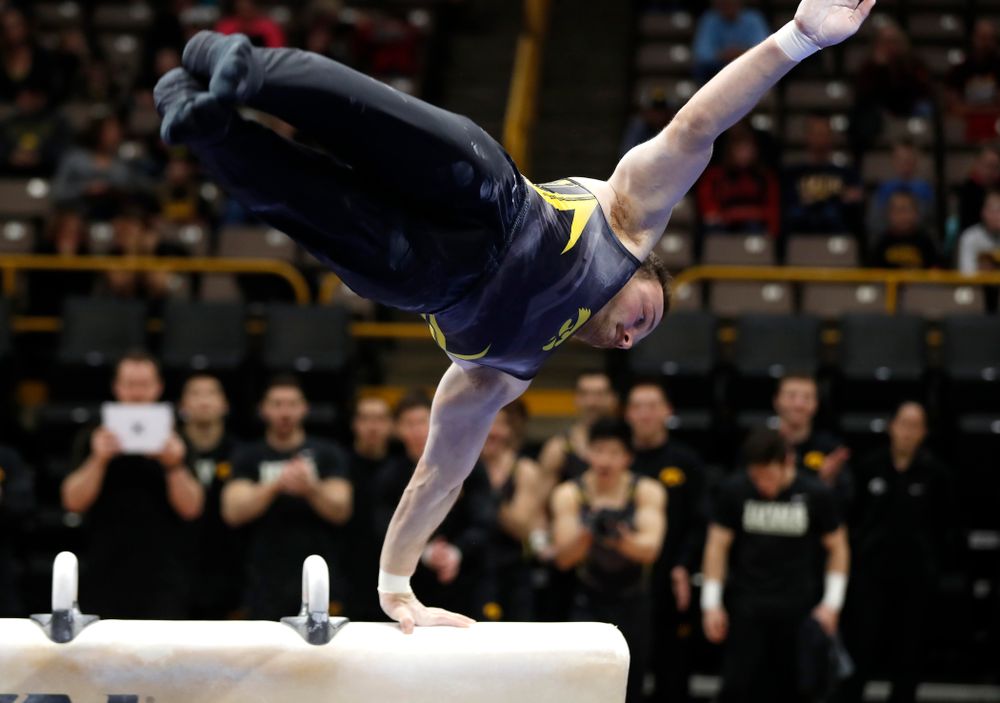 Dylan Ellsworth competes on the pommel horse  against Minnesota and Air Force 