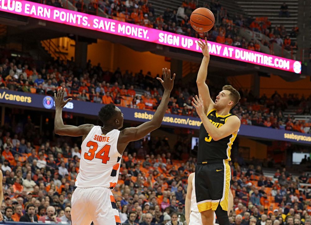 Iowa Hawkeyes guard Jordan Bohannon (3) makes a basket during the first half of their ACC/Big Ten Challenge game at the Carrier Dome in Syracuse, N.Y. on Tuesday, Dec 3, 2019. (Stephen Mally/hawkeyesports.com)