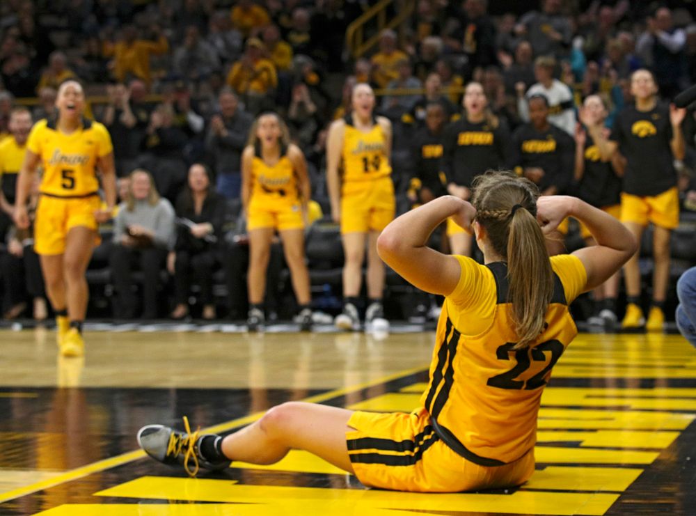 Iowa Hawkeyes guard Kathleen Doyle (22) flexes after making a basket while being fouled during the fourth quarter of their game at Carver-Hawkeye Arena in Iowa City on Thursday, January 23, 2020. (Stephen Mally/hawkeyesports.com)