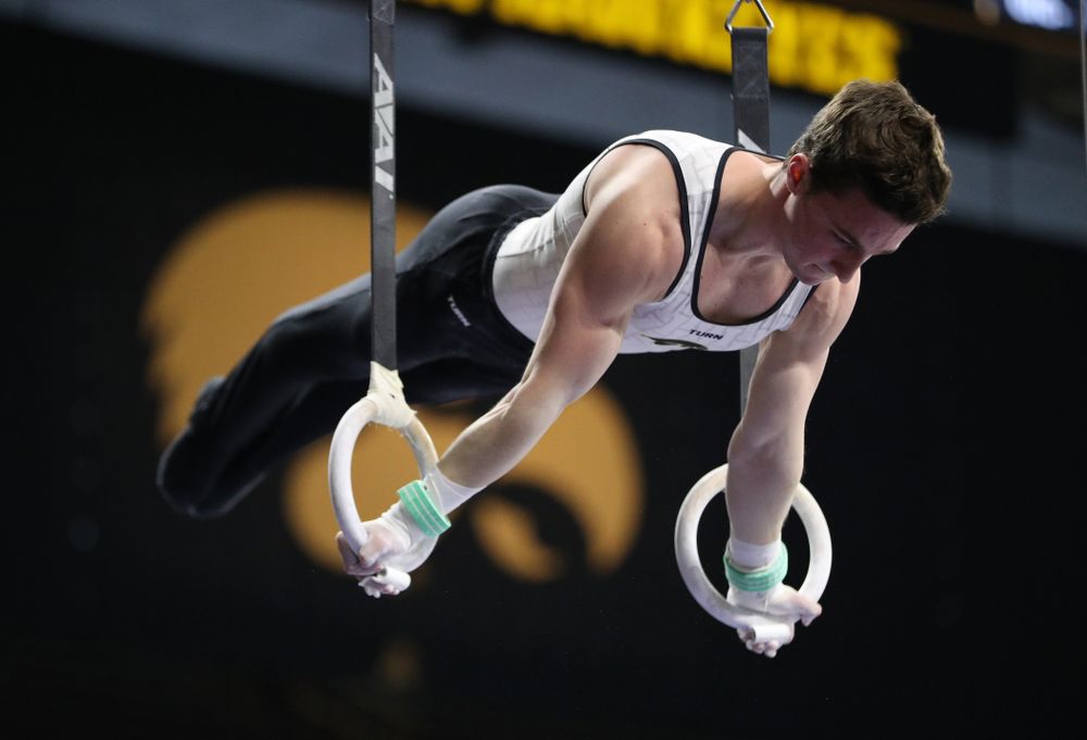 Iowa's Jake Brodarzon competes on the rings against UIC and Minnesota Saturday, February 2, 2019 at Carver-Hawkeye Arena. (Brian Ray/hawkeyesports.com)