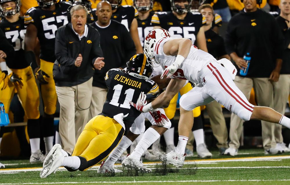 Iowa Hawkeyes defensive back Michael Ojemudia (11) makes a tackle during a game against Wisconsin at Kinnick Stadium on September 22, 2018. (Tork Mason/hawkeyesports.com)