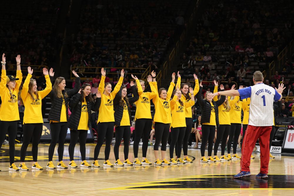 The Iowa Field Hockey Team, Soccer Team, Tennis Team, and Volleyball team play Simon Sez as they celebrate National Girls and Women in Sports day during halftime of the Iowa Hawkeyes game against the seventh ranked Maryland Terrapins Sunday, February 17, 2019 at Carver-Hawkeye Arena. (Brian Ray/hawkeyesports.com)
