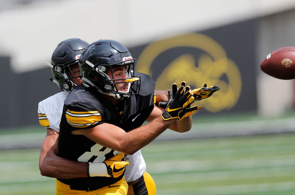 Iowa Hawkeyes wide receiver Nico Ragaini (89) and defensive back Julius Brents (20) during Kids Day Saturday, August 11, 2018 at Kinnick Stadium. (Brian Ray/hawkeyesports.com)