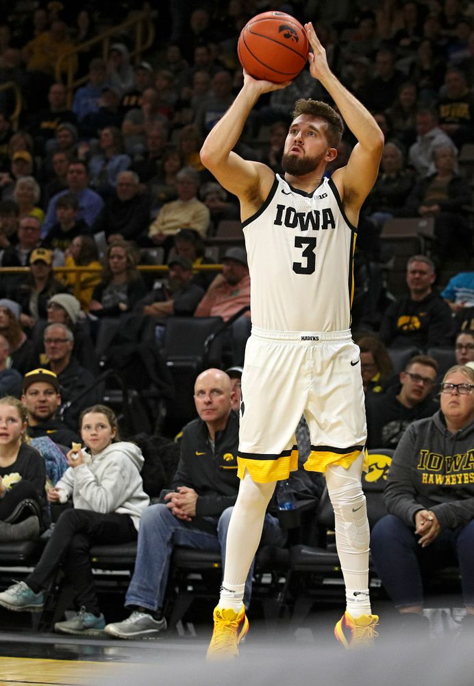 Iowa Hawkeyes guard Jordan Bohannon (3) makes a 3-pointer during the first half of their game at Carver-Hawkeye Arena in Iowa City on Friday, Nov 8, 2019. (Stephen Mally/hawkeyesports.com)
