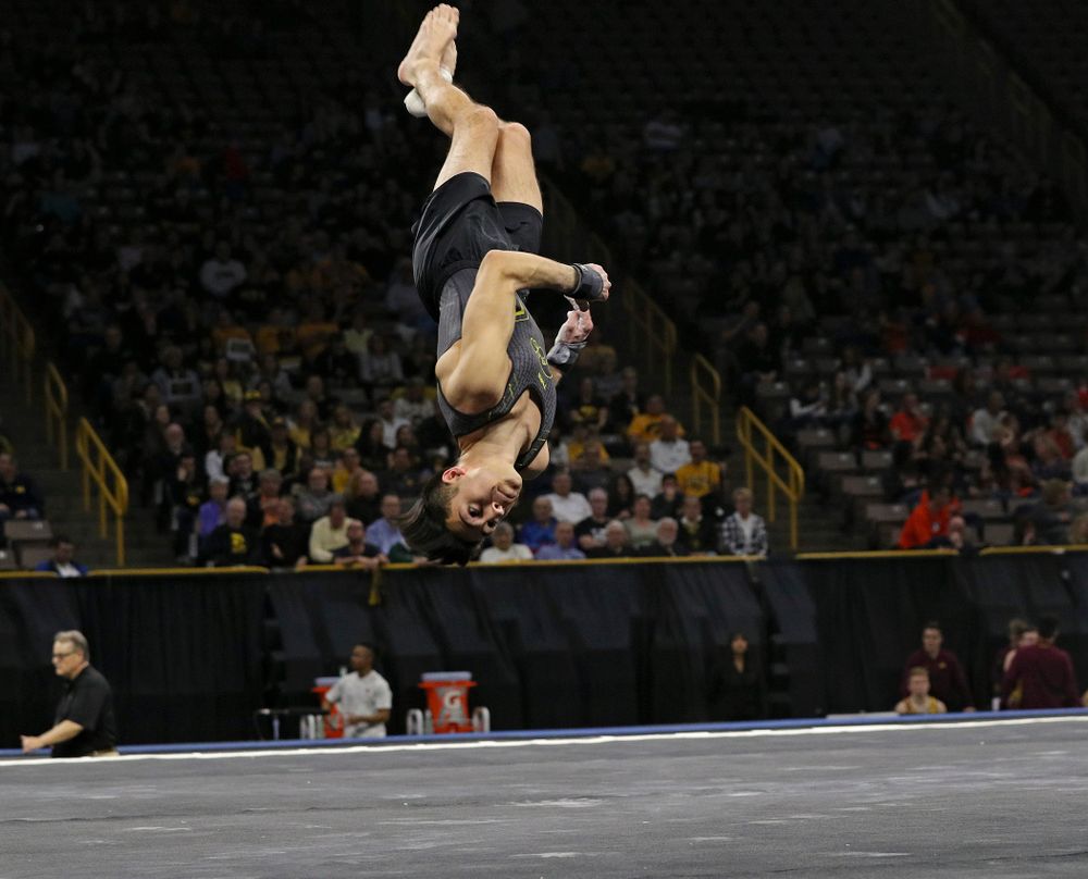 Iowa's Andrew Herrador competes in the floor during the first day of the Big Ten Men's Gymnastics Championships at Carver-Hawkeye Arena in Iowa City on Friday, Apr. 5, 2019. (Stephen Mally/hawkeyesports.com)