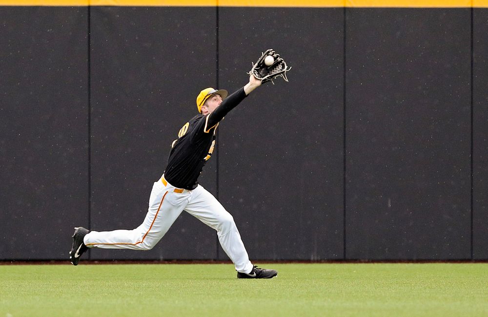 Iowa Hawkeyes right fielder Connor McCaffery (30) pulls in a fly ball for an out during the sixth inning of their game against Illinois State at Duane Banks Field in Iowa City on Wednesday, Apr. 3, 2019. (Stephen Mally/hawkeyesports.com)