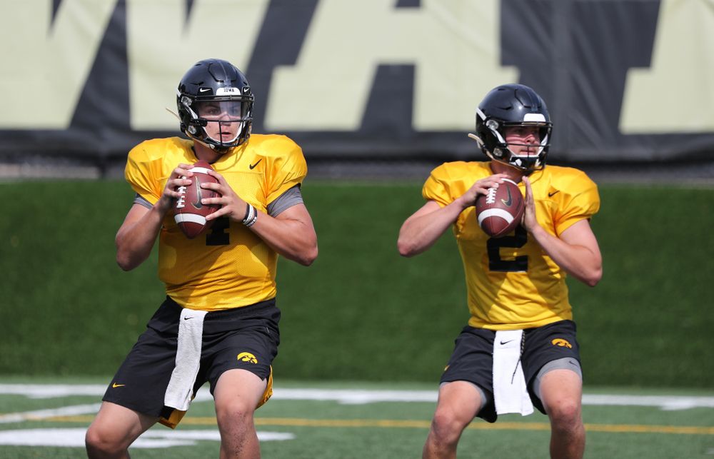 Iowa Hawkeyes quarterback Nate Stanley (4) and quarterback Peyton Mansell (2) during Fall Camp Practice No. 4 Monday, August 5, 2019 at the Ronald D. and Margaret L. Kenyon Football Practice Facility. (Brian Ray/hawkeyesports.com)