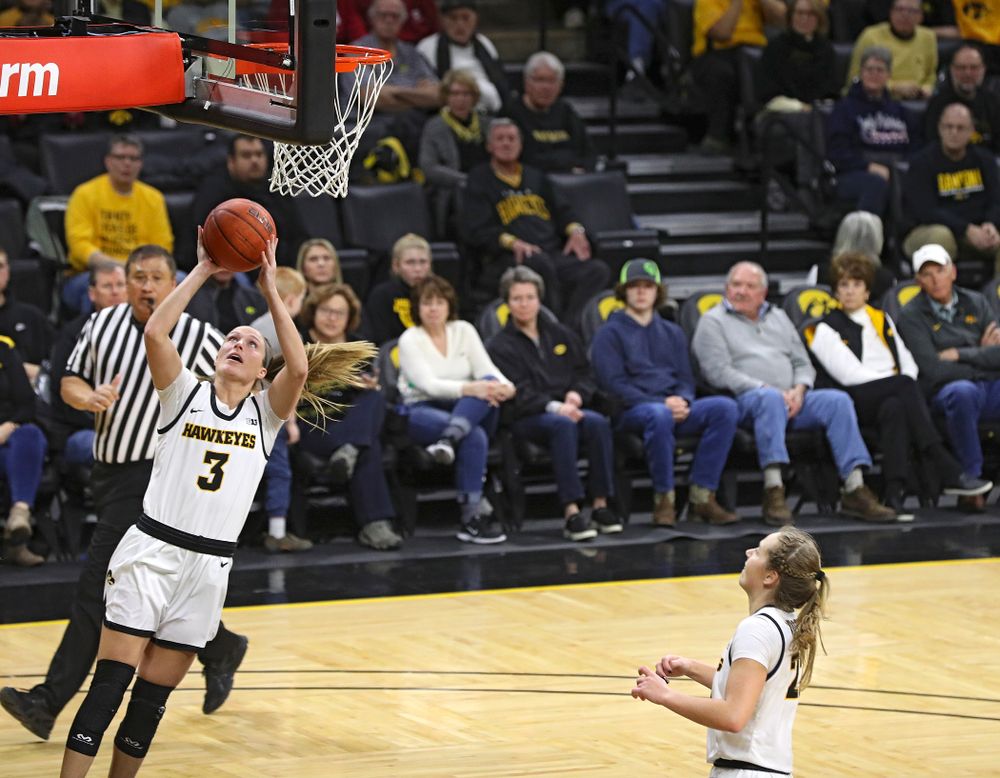 Iowa Hawkeyes guard Makenzie Meyer (3) scores a basket during the fourth quarter of their game at Carver-Hawkeye Arena in Iowa City on Sunday, January 12, 2020. (Stephen Mally/hawkeyesports.com)