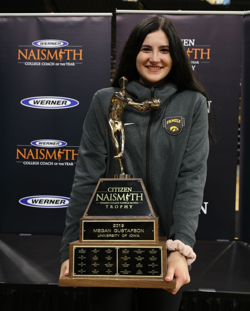 Iowa Hawkeyes forward Megan Gustafson (10) with the Naismith Player Of The Year Trophy during the teamÕs Celebr-Eight event Wednesday, April 24, 2019 at Carver-Hawkeye Arena. (Brian Ray/hawkeyesports.com)