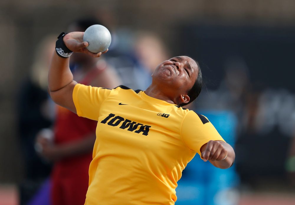 Iowa's Iowa's Nia Britt competes in the shot put during the 2018 MUSCO Twilight Invitational  Thursday, April 12, 2018 at the Cretzmeyer Tra