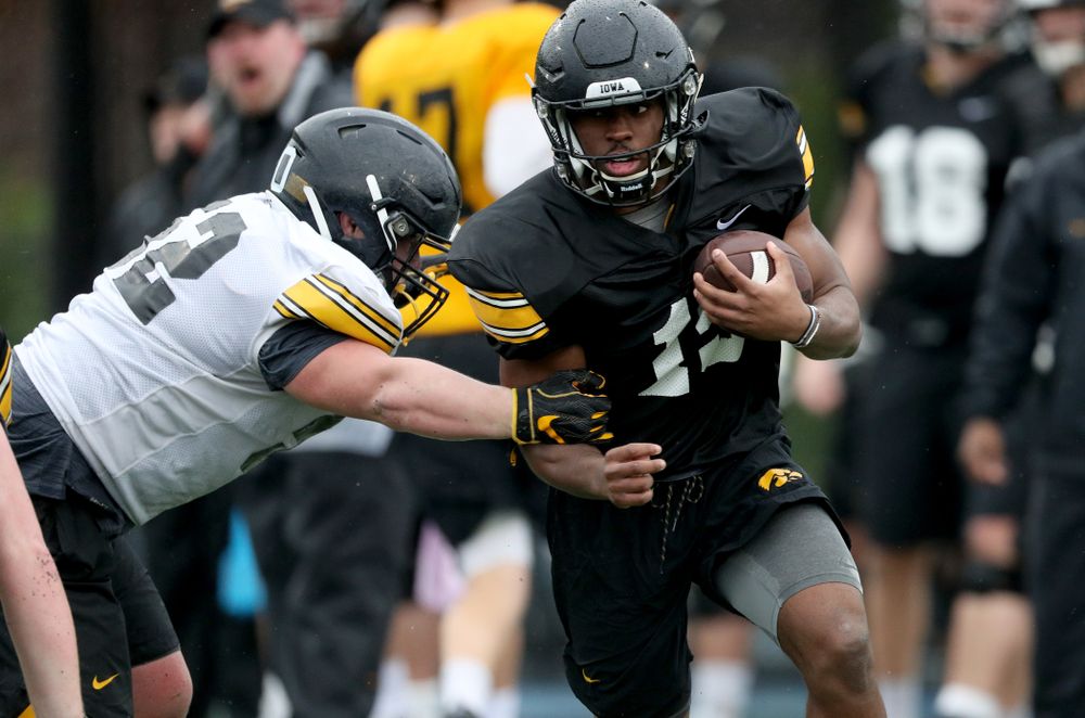 Iowa Hawkeyes running back Tyler Goodson (15) carries the ball during practice Monday, December 23, 2019 at Mesa College in San Diego. (Brian Ray/hawkeyesports.com)
