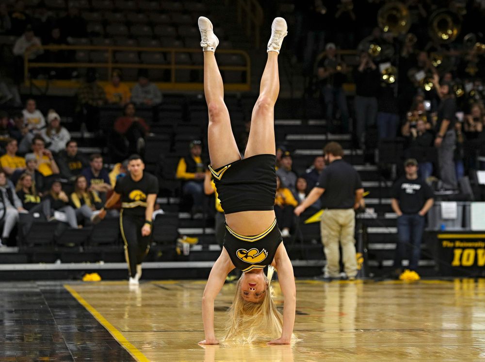 Iowa Cheerleaders do backflips down the court during the second half of their exhibition game against Lindsey Wilson College at Carver-Hawkeye Arena in Iowa City on Monday, Nov 4, 2019. (Stephen Mally/hawkeyesports.com)