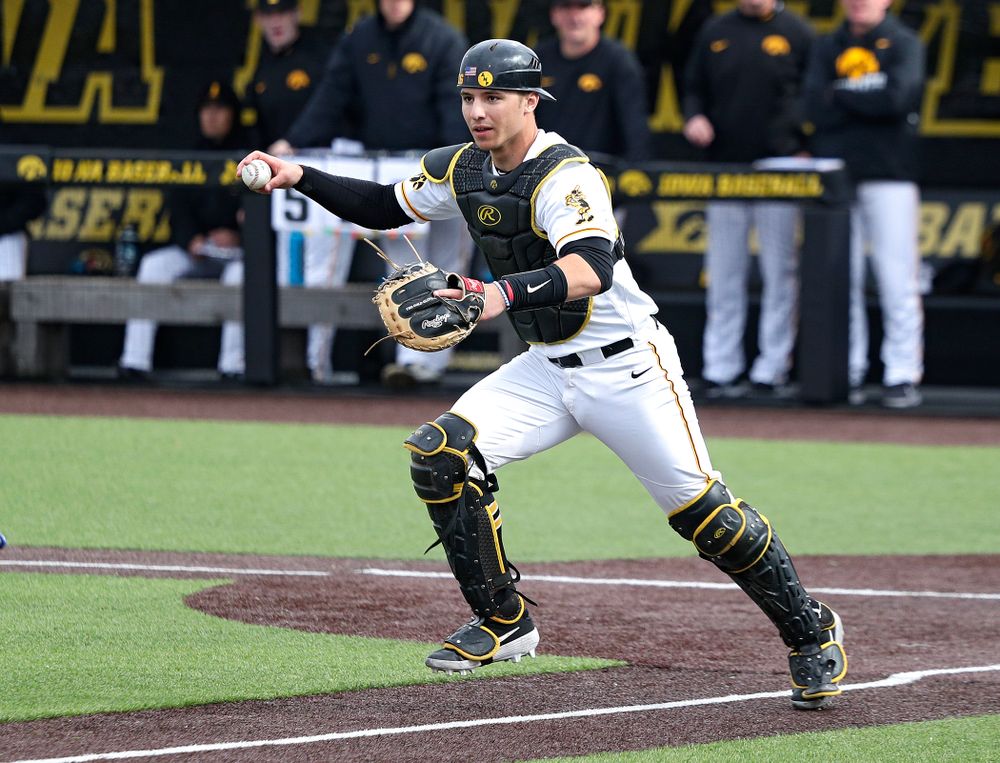 Iowa catcher Tyler Snep (16) chases a runner back to third during the sixth inning of their college baseball game at Duane Banks Field in Iowa City on Wednesday, March 11, 2020. (Stephen Mally/hawkeyesports.com)