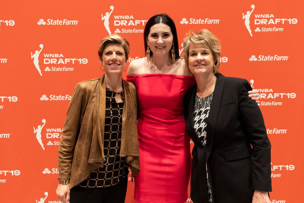 Iowa Hawkeyes forward Megan Gustafson (10) with head coach Lisa Bluder and associate head coach Jan Jensen after being selected by the Dallas Wings in the second round of the 2019 WNBA Draft Wednesday, April 10, 2019 at Nike New York Headquarters in New York City. (Brian Ray/hawkeyesports.com)