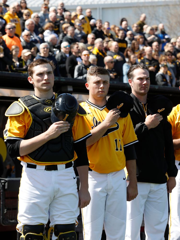 Iowa Hawkeyes catcher Brett McCleary (32), pitcher Cole McDonald (11), and pitcher Nick Allgeyer (24) before their game against the Michigan Wolverines Sunday, April 29, 2018 at Duane Banks Field. (Brian Ray/hawkeyesports.com)