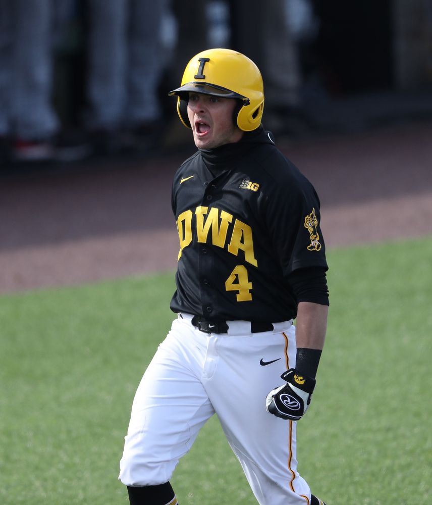 Iowa Hawkeyes infielder Mitchell Boe (4) reacts after hitting a game tying three-run homer against California State Northridge Sunday, March 17, 2019 at Duane Banks Field. (Brian Ray/hawkeyesports.com)