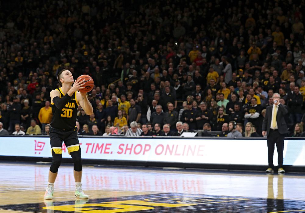Iowa Hawkeyes guard Connor McCaffery (30) shoots a free throw after a technical foul was called on the Wisconsin Badgers during the second half of their game at Carver-Hawkeye Arena in Iowa City on Monday, January 27, 2020. (Stephen Mally/hawkeyesports.com)