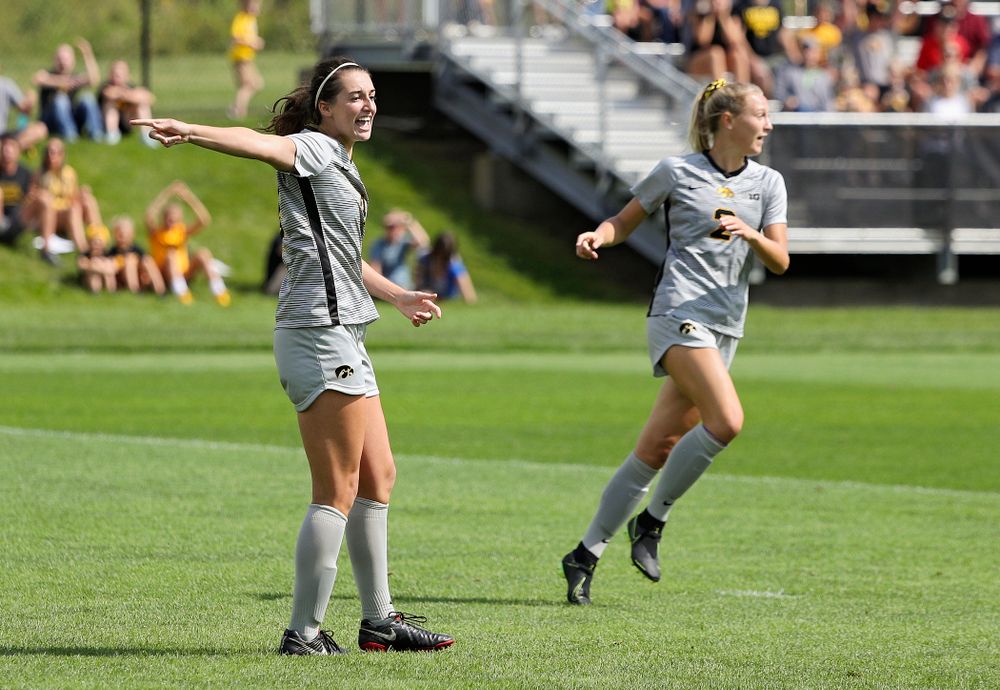 Iowa forward Kaleigh Haus (4) points after scoring a goal during the first half of their match at the Iowa Soccer Complex in Iowa City on Sunday, Sep 1, 2019. (Stephen Mally/hawkeyesports.com)