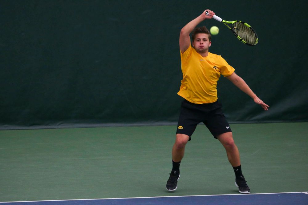 Iowa's Will Davies at a tennis match vs Drake  Friday, March 8, 2019 at the Hawkeye Tennis and Recreation Complex. (Lily Smith/hawkeyesports.com)