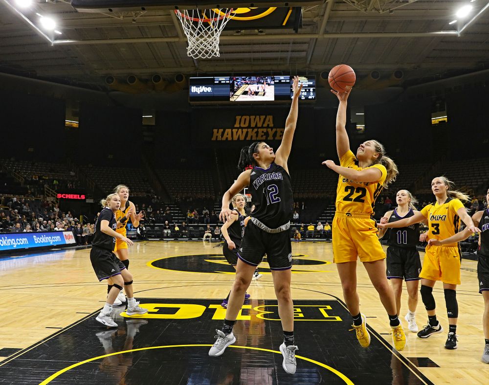 Iowa guard Kathleen Doyle (22) puts up a shot during the first quarter of their game against Winona State at Carver-Hawkeye Arena in Iowa City on Sunday, Nov 3, 2019. (Stephen Mally/hawkeyesports.com)