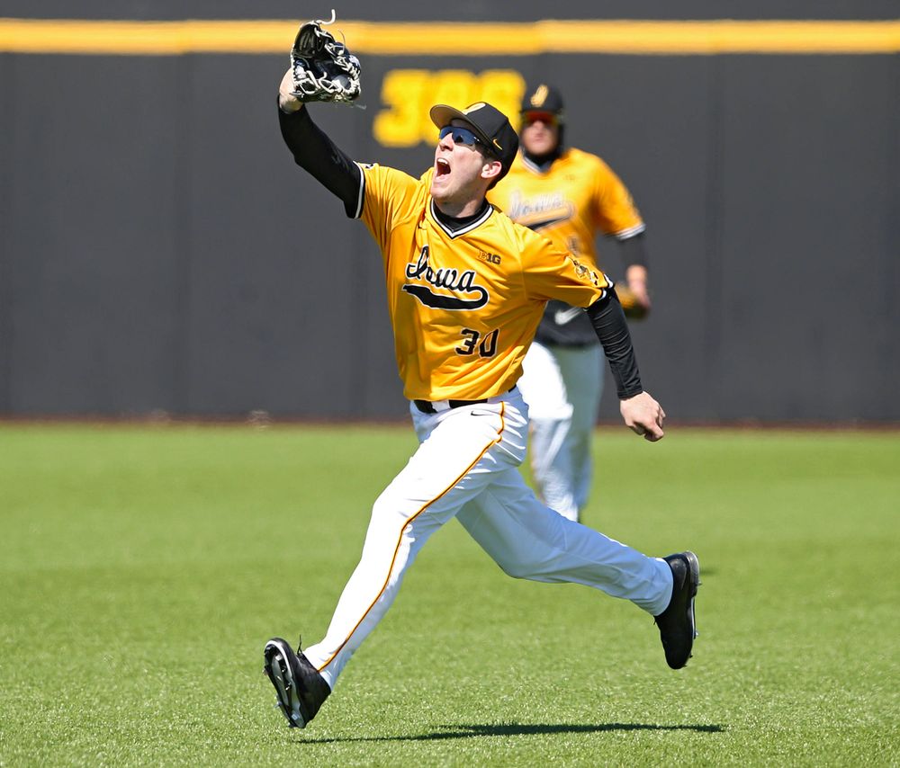 Iowa Hawkeyes Connor McCaffery (30) makes a running catch for an out during the fourth inning against Illinois at Duane Banks Field in Iowa City on Sunday, Mar. 31, 2019. (Stephen Mally/hawkeyesports.com)