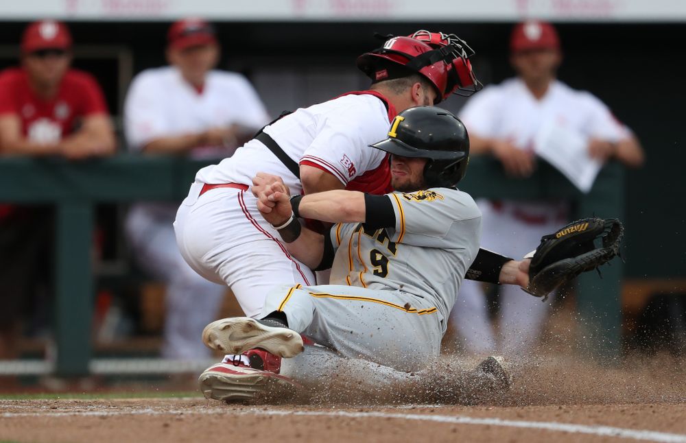 Iowa Hawkeyes outfielder Ben Norman (9) scores against the Indiana Hoosiers in the first round of the Big Ten Baseball Tournament Wednesday, May 22, 2019 at TD Ameritrade Park in Omaha, Neb. (Brian Ray/hawkeyesports.com)