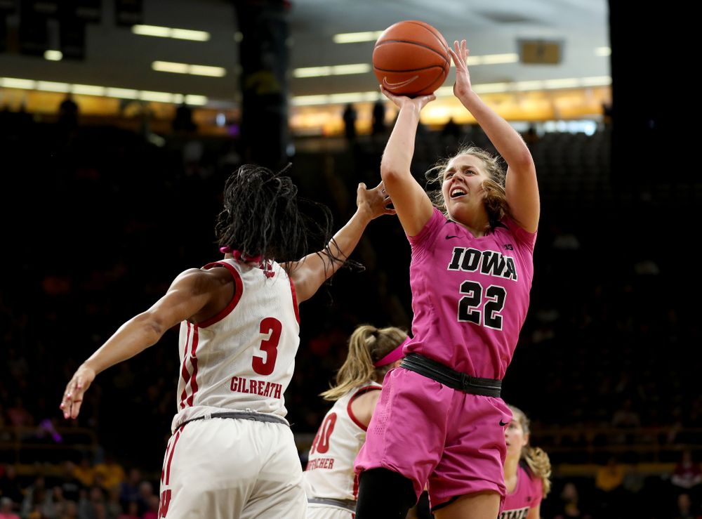 Iowa Hawkeyes guard Kathleen Doyle (22) pulls up for a shot against the Wisconsin Badgers Sunday, February 16, 2020 at Carver-Hawkeye Arena. (Brian Ray/hawkeyesports.com)
