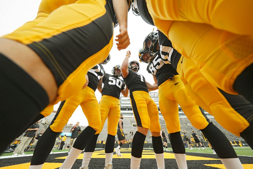 Iowa Hawkeyes punter Colten Rastetter (7) talks as he huddles with the special teams unit before their game at Kinnick Stadium in Iowa City on Saturday, Sep 28, 2019. (Stephen Mally/hawkeyesports.com)